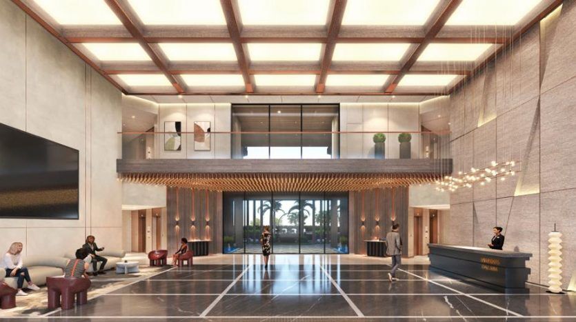 Hall d'entrée luxueux avec de hauts plafonds, une décoration moderne, un sol en marbre spacieux et une réception accueillante gérée par une agence immobilière exclusive de Dubaï. Les gens sont assis et debout dans un