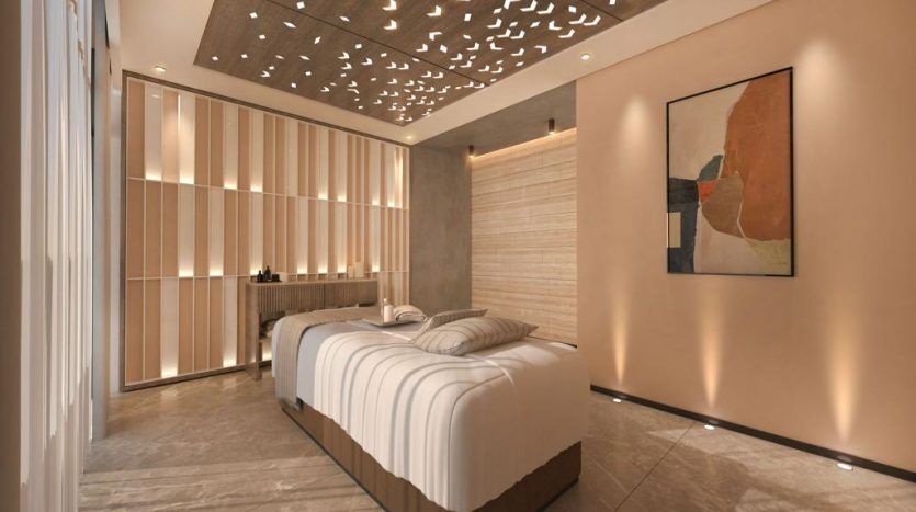 Une chambre moderne et luxueuse dans une villa de Dubaï comprenant un lit élégant avec des draps blancs, un éclairage d'ambiance chaleureux, des panneaux en bois élégants et une peinture abstraite au mur.