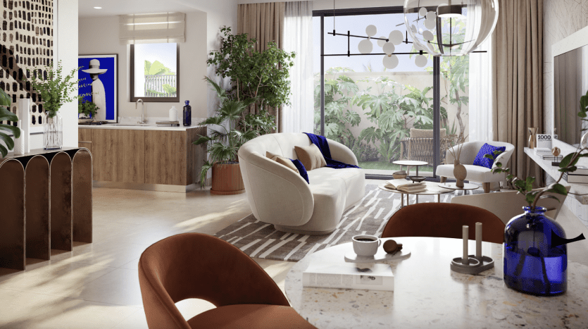 Salon moderne dans un appartement à Dubaï avec lumière naturelle diffusant à travers de grandes fenêtres, avec une décoration blanche et beige, des meubles élégants, des plantes et des éléments artistiques, créant une atmosphère chaleureuse et accueillante.