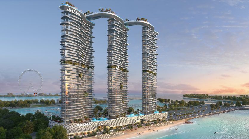 Un rendu numérique de deux gratte-ciel futuristes et incurvés surplombant un front de mer à Dubaï, avec une verdure luxuriante et une grande roue en arrière-plan au coucher du soleil.