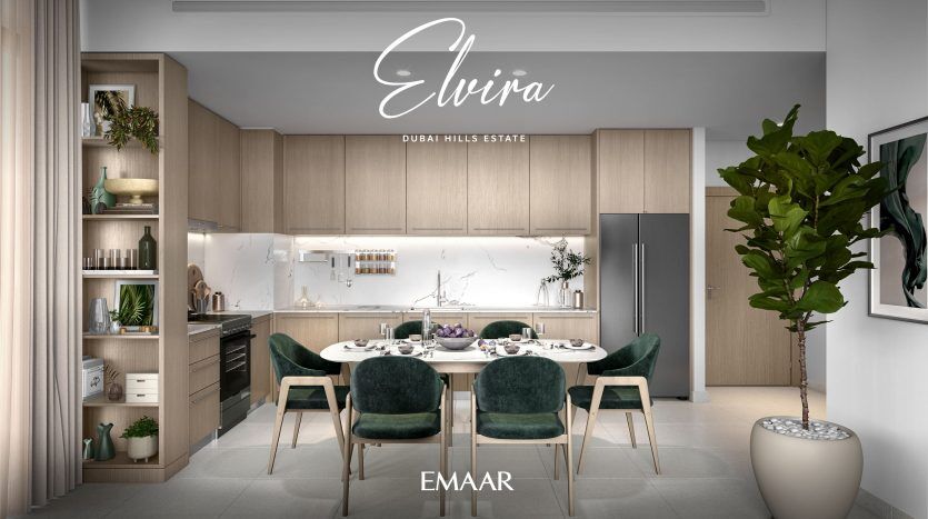 Cuisine et salle à manger modernes dans un luxueux appartement de Dubaï comprenant des armoires en bois élégantes, un comptoir en marbre blanc et une table à manger ovale avec des chaises vert émeraude. Une grande plante en pot ajoute un