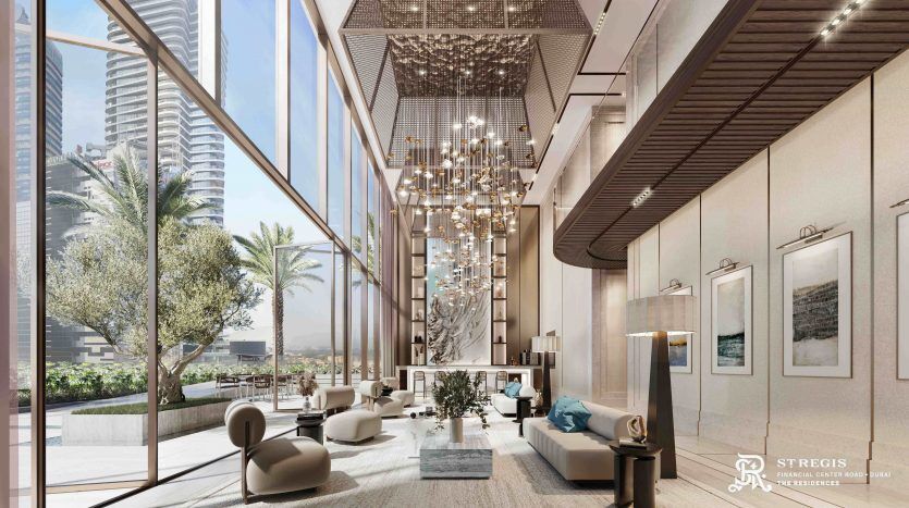 Hall d'entrée luxueux à la décoration moderne, doté de chaises élégantes, d'un lustre élégant, de baies vitrées montrant l'horizon de Dubaï et d'un aménagement spacieux avec des expositions d'art.