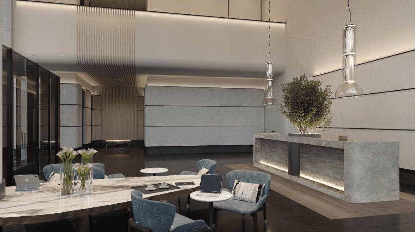 Hall de bureau moderne avec de luxueux fauteuils bleus, des tables rondes blanches, un bureau de réception élégant, d'élégantes suspensions et des plantes, conçu avec une esthétique élégante et contemporaine dans une villa haut de gamme de Dubaï.