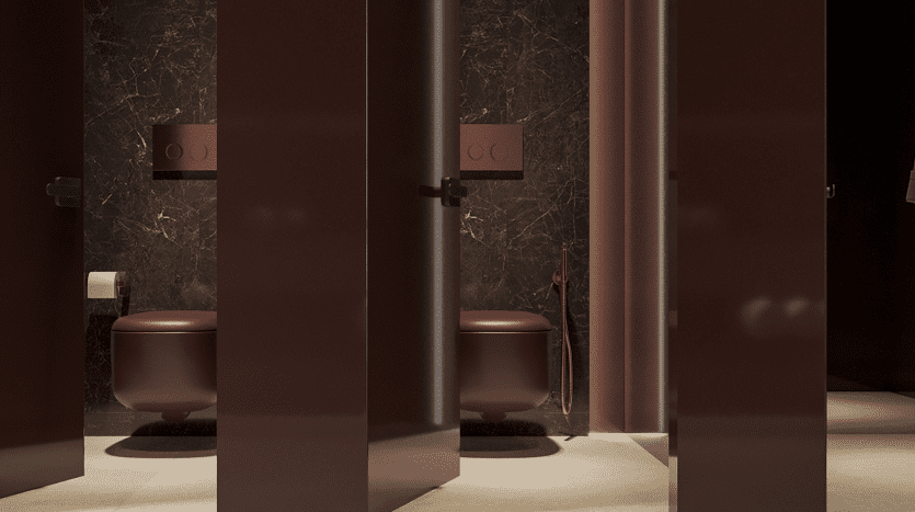 Intérieur de toilettes modernes avec murs en marbre foncé dans une villa de Dubaï, comprenant une porte de cabine ouverte révélant des toilettes avec un plafonnier et un tapis circulaire. Un éclairage chaleureux rehausse l’ambiance sophistiquée.