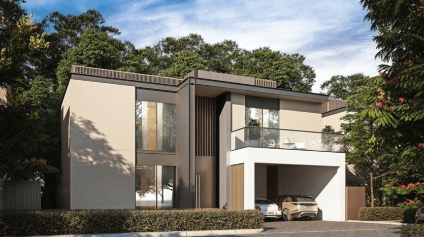 Maison moderne à deux étages avec un toit plat, de grandes fenêtres et un balcon entouré d'arbres. Une voiture est garée dans l'allée. La façade présente des tons beiges et marron. Idéal pour ceux que ça intéresse