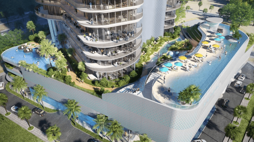 Vue aérienne d'un complexe de villas modernes à Dubaï avec une piscine sur le toit et des espaces paysagers verdoyants, entourés de rues urbaines avec des voitures.