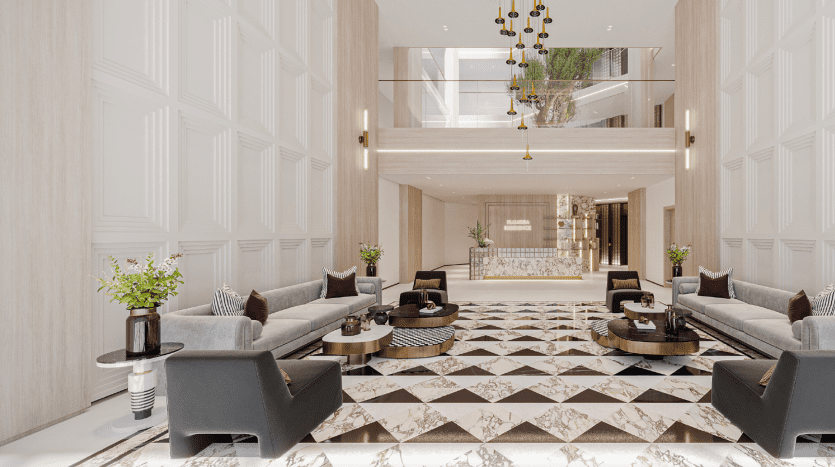 Le hall d'une luxueuse villa à Dubaï comprend un sol à motifs géométriques, des sièges luxueux, des lustres ornés et un grand escalier menant à un niveau supérieur avec balcons.