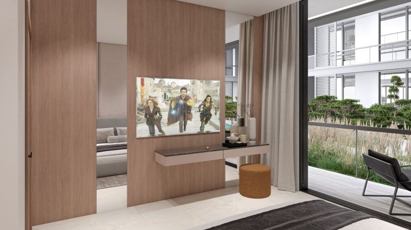 Un intérieur de maison moderne comprenant une entrée en bois avec une peinture au mur, une console élégante et une vue sur un balcon donnant sur la verdure luxuriante dans une villa de Dubaï.