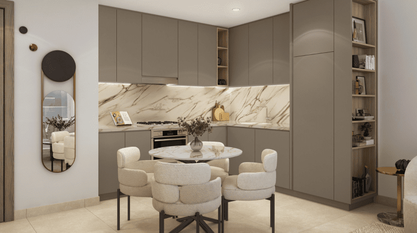 Une cuisine moderne dans une villa de Dubaï avec des armoires beiges et grises, des comptoirs en marbre et un petit coin repas avec une table ronde et des chaises moelleuses.