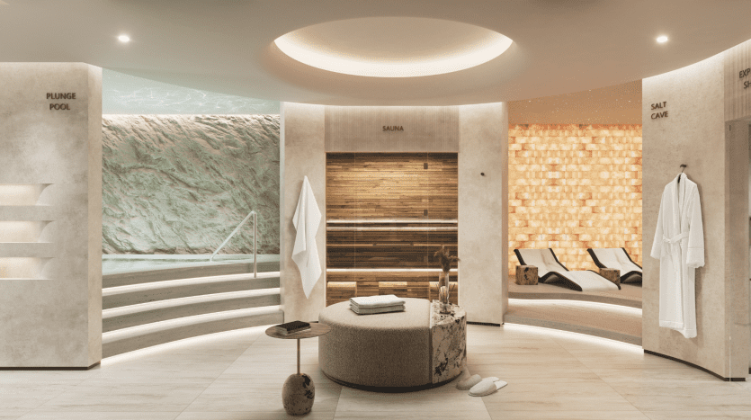 Intérieur de spa luxueux comprenant un sauna, un bassin profond et une grotte de sel, avec un éclairage ambiant et une atmosphère apaisante dans un appartement prestigieux de Dubaï.