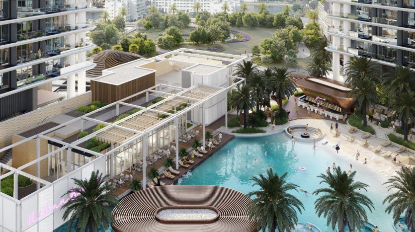 Vue aérienne d'un complexe luxueux comprenant des immeubles d'appartements modernes avec balcons, une grande piscine avec bains de soleil et un environnement verdoyant à Dubaï.