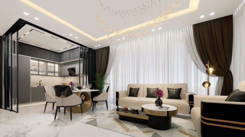 Stylish modern living room with beige sofas, glass coffee table and long curtains in a Dubai villa. Includes an adjoining dining area and elegant black and gold decorative touches.