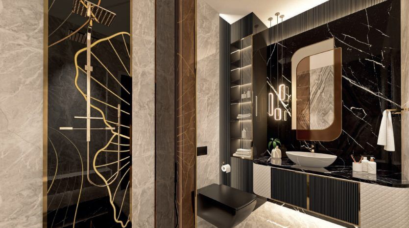 Luxurious bathroom in a Dubai villa with marble walls, unique oval mirror with light accents, black vanity, geometric tiling and modern shower with gold fixture.