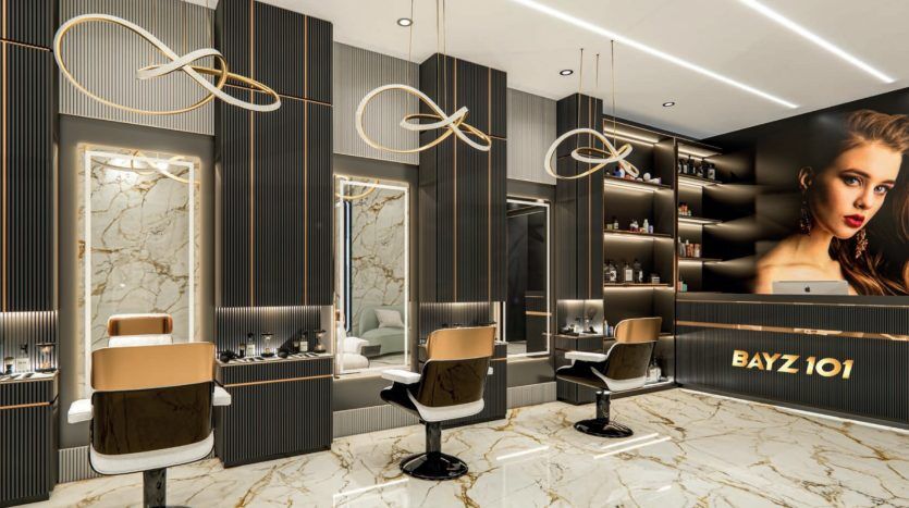 Luxurious interior of a hair salon in Dubai featuring three styling chairs with mirrors set on striped wood panels, marble accents and ambient lighting. A wall-mounted shelf displays a variety of beauty products.