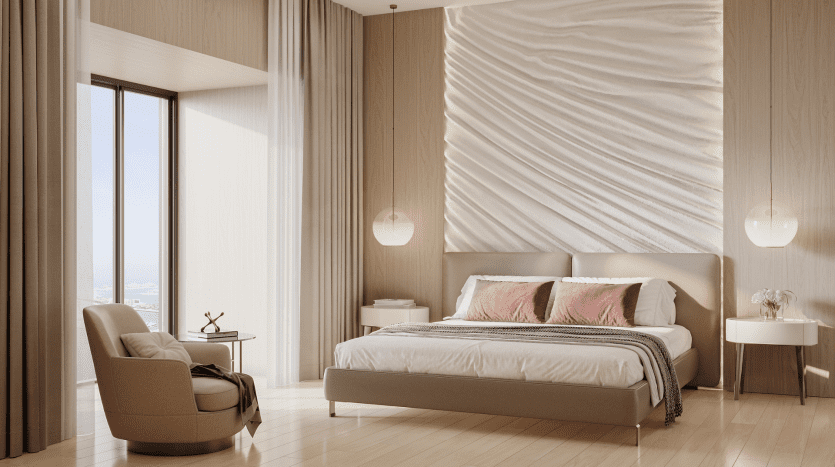 Une chambre moderne et ensoleillée dans un appartement Dubaï comprenant un grand lit avec une literie rose et grise, un fauteuil moelleux et une décoration contemporaine, avec de grandes fenêtres offrant une vue sur l'extérieur.