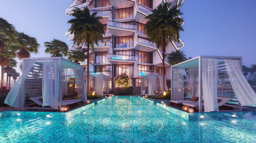 Piscine luxueuse de l'hôtel au crépuscule avec des cabanes éclairées et une villa moderne et géométrique à Dubaï en arrière-plan, se reflétant sur l'eau turquoise scintillante.
