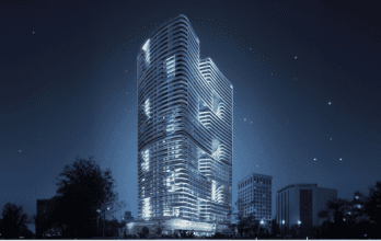 A futuristic skyscraper in Dubai illuminated at night with a design featuring curved facades superimposed on a starry sky, surrounded by other urban structures.