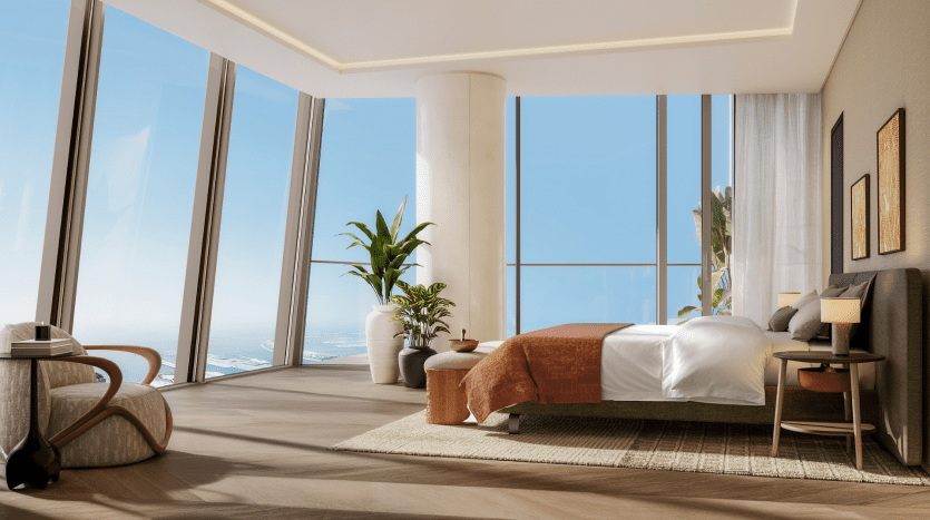 Une chambre moderne dans une villa à Dubaï avec de grandes baies vitrées offrant une vue panoramique sur la mer, un lit douillet, des plantes et une décoration minimaliste.