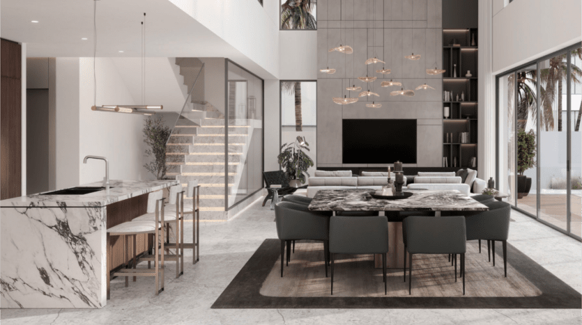 Le salon et salle à manger moderne et ouvert du Watercrest Ellington comprend une grande table à manger en marbre avec huit chaises, un îlot de cuisine élégant avec des tabourets et un coin salon confortable avec une télévision. L'espace dispose d'un éclairage contemporain, d'un escalier et de grandes fenêtres offrant une vue sur les palmiers.