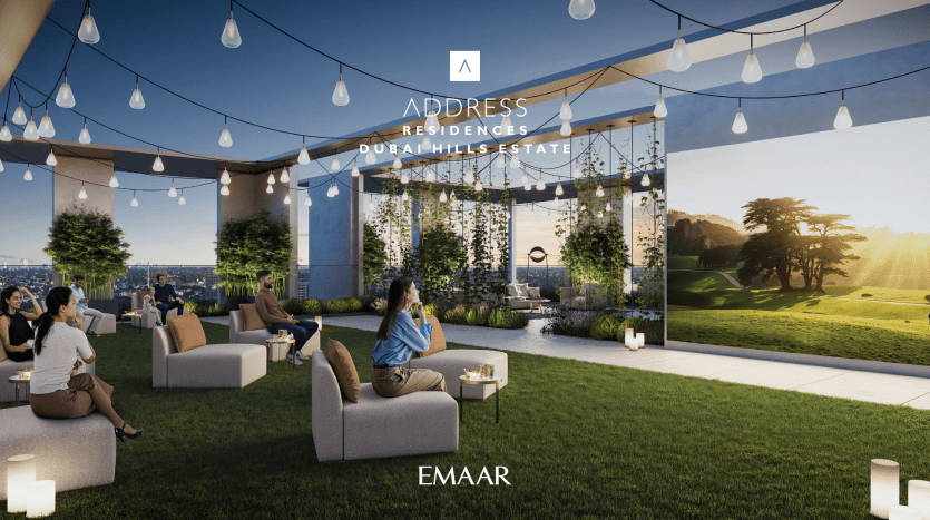 At Address Residences Dubai Hills, a sunset rooftop garden features seating and strings of lights, where guests can enjoy drinks. A large screen displays serene hills and trees, reinforcing the modern elegance of this luxurious setting that promotes ultimate relaxation.