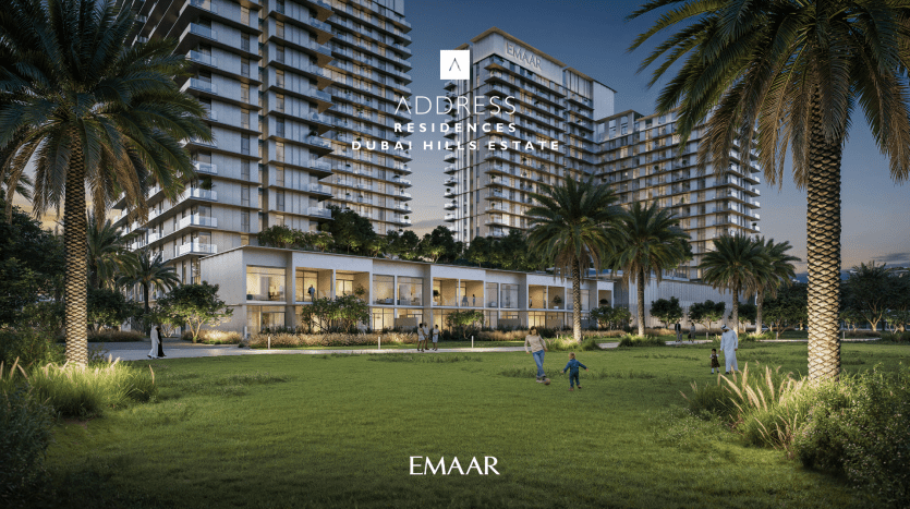 Address Residences Dubai Hills Estate by Emaar is a modern residential complex of large, light-filled buildings surrounded by palm trees and green lawns. It offers a serene environment. Families and individuals can be seen enjoying the open space in the foreground.