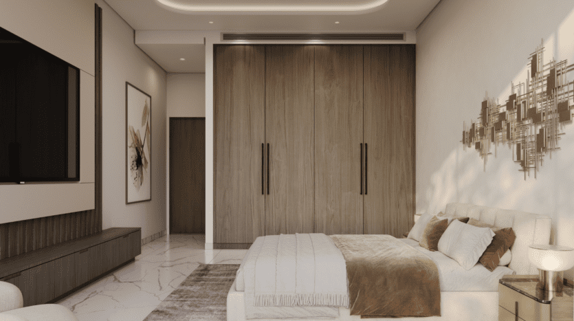 La chambre moderne Skyhills 2 présente une palette de couleurs neutres avec un grand lit, une literie beige et marron, une armoire en bois ornée de poignées noires, des œuvres d'art murales abstraites et une télévision à écran plat. Le carrelage brillant rehausse le design élégant de cette retraite sereine.