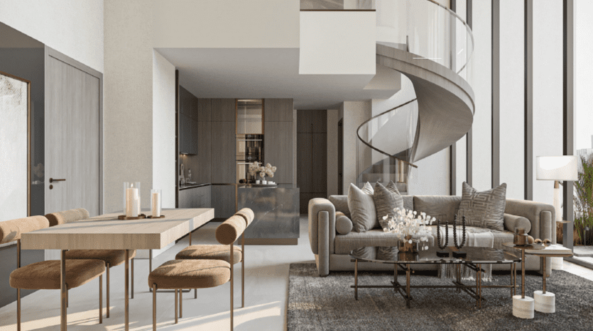 Un salon et une salle à manger modernes dans le très convoité One Park Square, avec un escalier en colimaçon. L'espace comprend un canapé beige, une table basse en verre, une table à manger en bois avec des chaises assorties et un coin cuisine élégant. De hautes fenêtres offrent une abondante lumière naturelle.