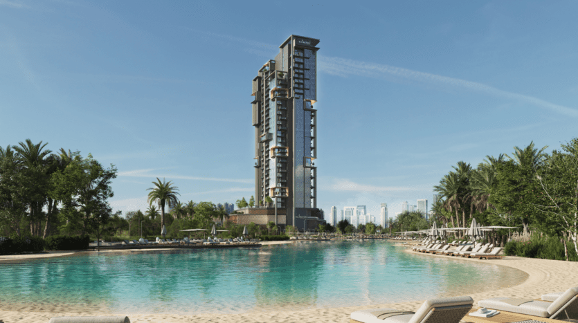 Highgrove's modern, tall building stands on the edge of a tranquil lagoon with clear waters, surrounded by lush vegetation and palm trees. Sun loungers rest on the sandy beach under the bright blue sky, with the city skyline in the distance in the background.
