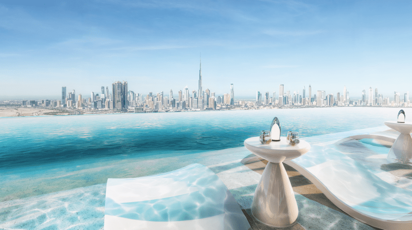 Le toit de l'Amaal 8 dispose d'une luxueuse piscine à débordement avec des chaises longues immergées, offrant une vue imprenable sur l'horizon dominé par un gratte-ciel imposant sous un ciel bleu clair.