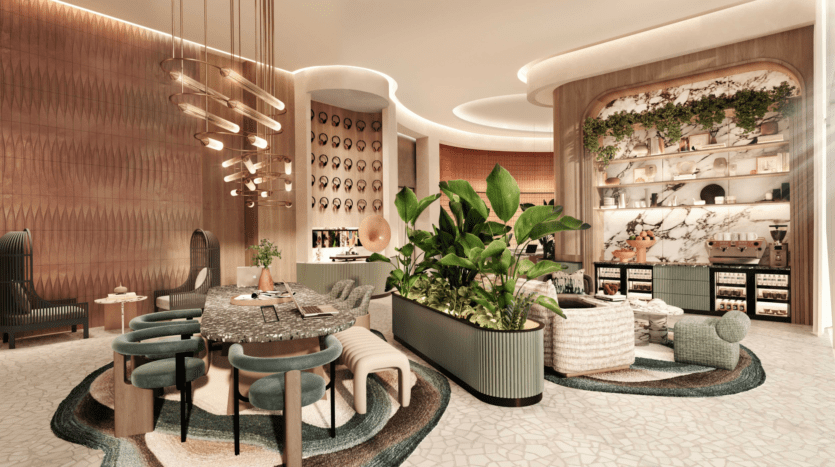 Le salon moderne et élégant du W Residences comprend des sièges moelleux, des chaises en velours vert et un grand ensemble de plantes centrales. Éclairé par des luminaires suspendus contemporains, l'espace dispose d'un mur à motifs de marbre avec des étagères décoratives remplies d'objets divers.