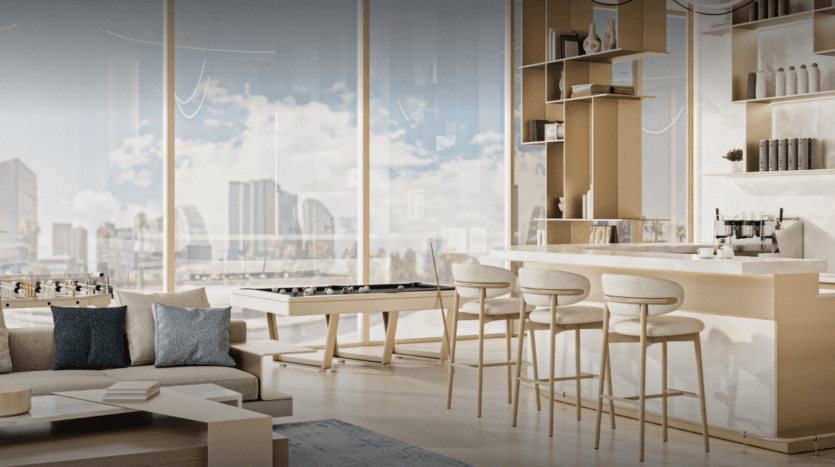 Un salon moderne et bien éclairé comprenant un bar avec des tabourets hauts, une table de billard et un coin salon confortable. De grandes fenêtres mettent en valeur le paysage urbain de Cove Edition 3 et la lumière naturelle remplit l'espace, mettant en valeur le design élégant et la palette de couleurs neutres.