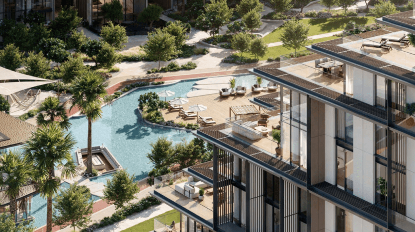 Vue aérienne du complexe d'appartements Crestlane avec une élégante façade en verre, niché près de City Walk. Il dispose d'une piscine entourée de chaises longues et de parasols, de jardins paysagers luxuriants et de palmiers gracieux. Les balcons donnent sur la piscine sereine, offrant une touche de luxe.