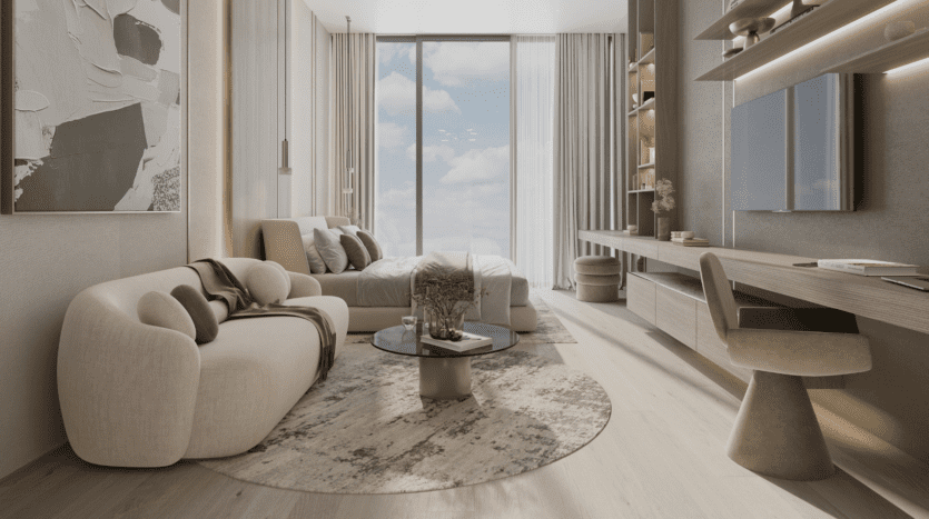 Un salon moderne et minimaliste sur Cove Boulevard comprend un canapé couleur crème, une table basse ronde en verre avec une pièce décorative et un tapis. Une grande fenêtre révèle un ciel bleu avec des nuages. À droite, il y a un bureau avec une chaise et des étagères exposant des objets de décoration.