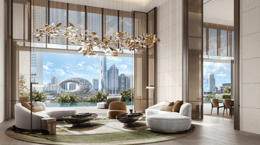 Luxurious modern living room with bay windows, elegant furnishings and gold-leaf chandelier. The windows offer breathtaking city views, unique architecture and a large outdoor terrace.