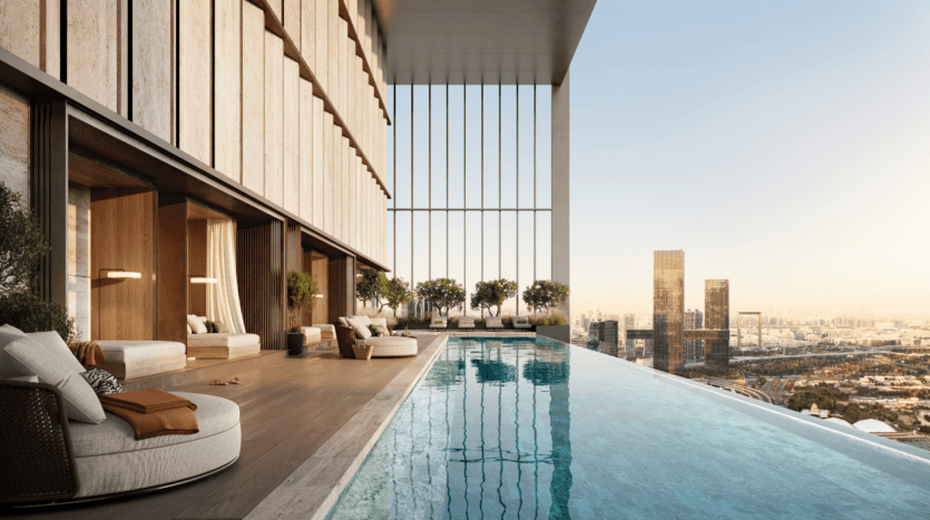 Luxurious rooftop infinity pool, surrounded by wooden cabins and sun loungers, overlooking the city at sunset. Tall buildings and green spaces are visible in the distance through large open windows.