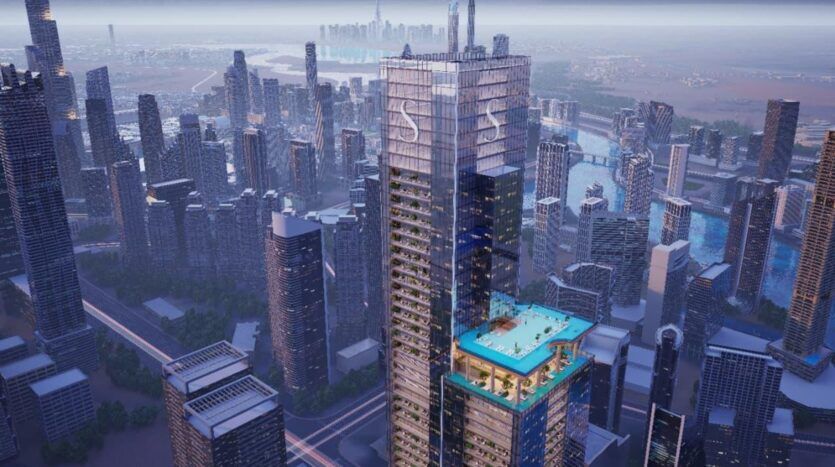 Un grand gratte-ciel moderne avec une piscine SkyParks sur une terrasse inférieure se dresse parmi de nombreux immeubles de grande hauteur dans un paysage urbain, avec une rivière et d'autres gratte-ciel visibles à l'arrière-plan.