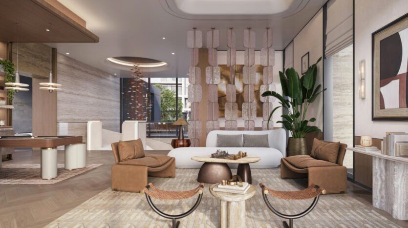 A modern hotel lobby with brown leather chairs, a white sofa, coffee tables, abstract art, a large potted plant, and decorative partitions, all in neutral tones, with plenty of natural light and stunning views of the Eltiera.