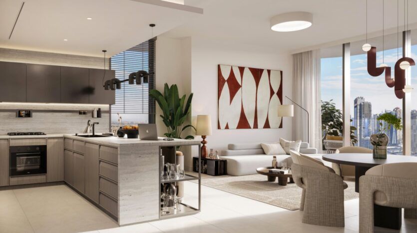 The kitchen and living room are modern and open-plan, featuring neutral tones, an island, a dining table, abstract wall art, large windows offering stunning views of the Eltiera, potted plants, and contemporary lighting fixtures.