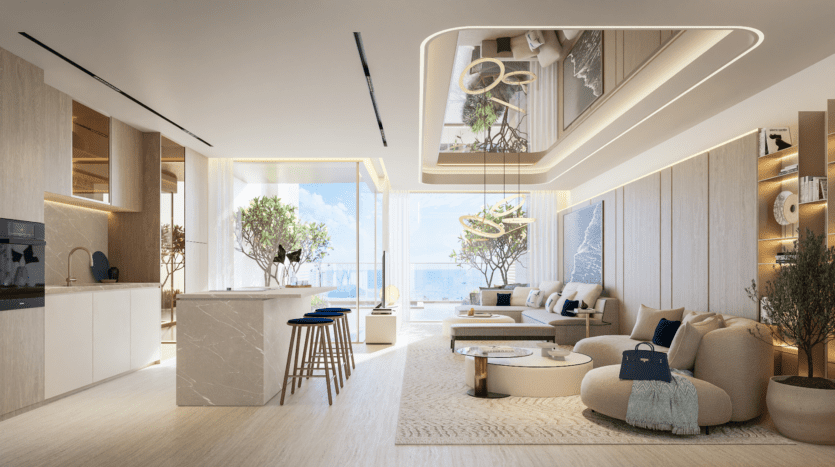 Un salon moderne et spacieux avec de grandes fenêtres offrant une vue sur la mer capture l'essence du charme de Palm Jumeirah de Vitalia. Doté de canapés beiges, d'un îlot de cuisine avec tabourets et de plafonniers géométriques, les plantes en pot ajoutent de la verdure tandis que les accents de bois clair créent une atmosphère chaleureuse.