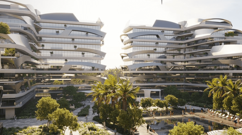 A modern architectural complex, Tonino Lamborghini Residences Dubai, comprises two multi-storey buildings with curved, interconnected balconies and abundant greenery. The foreground features a landscaped area with palm trees, a swimming pool and people lounging by the pool.