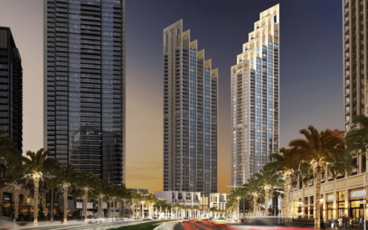 Una vista panorámica de Blvd Heights en Dubai al atardecer, mostrando altos rascacielos con ventanas iluminadas y una concurrida calle con semáforos borrosos.