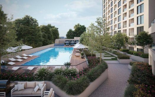 Representación en 3D de un moderno patio de hotel en Dubai con una gran piscina rodeada de tumbonas, macizos de flores y una lujosa zona de descanso, con un rascacielos al fondo.