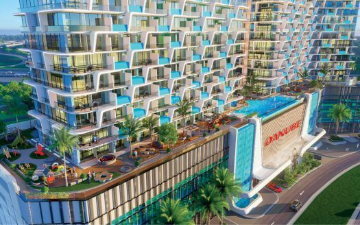 Un dinámico y moderno piso en altura con grandes balcones, una colorida zona de piscina y exuberantes jardines, situado junto a una soleada calle y zonas verdes.
