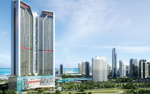 Dos altísimos rascacielos con la marca "DAMACURE" dominan el horizonte de una ciudad moderna con una exuberante vegetación, una noria y un océano azul claro de fondo, mostrando la principal oferta inmobiliaria de Dubai.