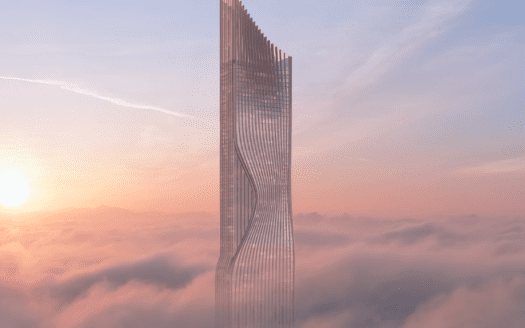Un rascacielos futurista con elementos de diseño ondulantes se alza entre nubes rosas y naranjas, iluminado por la suave luz de un sol poniente o naciente. El cielo está generalmente despejado, con algunas nubes difusas que contribuyen a crear una atmósfera etérea.