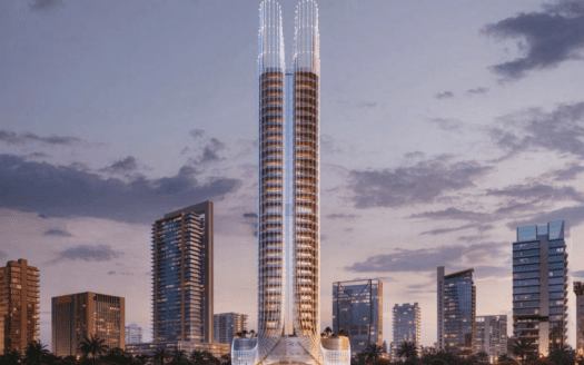 Un paisaje urbano moderno al atardecer destaca el emblemático Binghatti Skyhall, un rascacielos con dos torres iluminadas, rodeado de otros rascacielos. El cielo está parcialmente nublado, teñido de un tono violeta anaranjado, mientras que las palmeras se alinean elegantemente en primer plano.