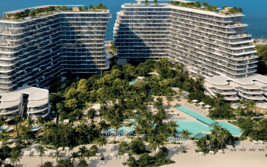 Vista aérea de dos modernos edificios hoteleros curvos en primera línea de playa en Passo by Beyond Palm Jumeirah, rodeados de exuberante vegetación, múltiples piscinas, palmeras, zonas de relajación y una playa de arena frente al océano al fondo.