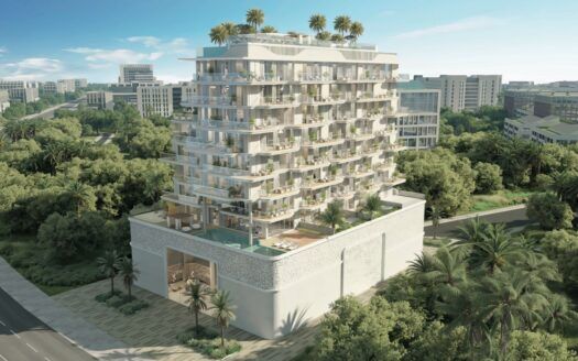 En la ciudad de Meriden se alza un moderno edificio de varias plantas con balcones y jardines en las azoteas, rodeado de frondosos árboles y vegetación, con otros edificios visibles al fondo.
