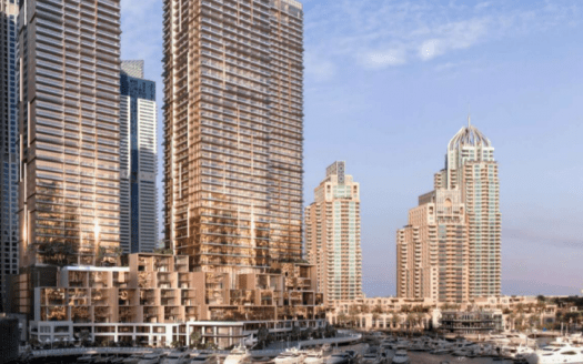 Bord de mer avec gratte-ciel modernes et porte Jumeirah Living Marina, représenté sous un ciel clair au crépuscule, mettant en valeur les façades réfléchissantes des bâtiments et la diversité architecturale.