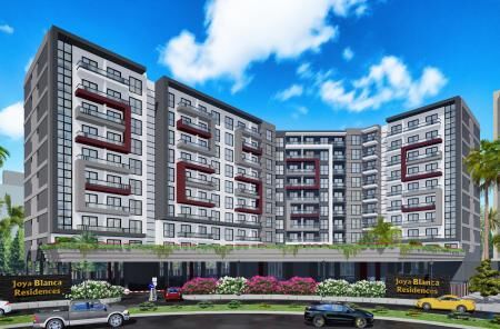 Rendu numérique d'un complexe d'appartements moderne appelé résidences joya blanca aux façades grises et rouges, entouré d'une verdure luxuriante et de voitures garées sous un ciel bleu.